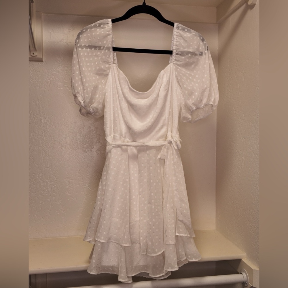B. Smart mini dress with puff sleeves